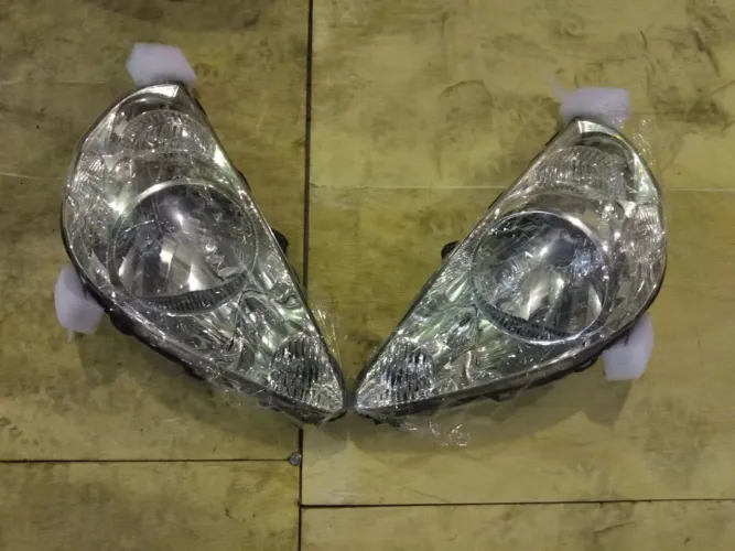 Farol cromado Honda Fit 2006