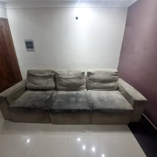 Sofa semi novo retratil grande vira praticamente uma cama
