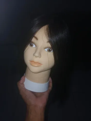 Cabeça de boneca para treino