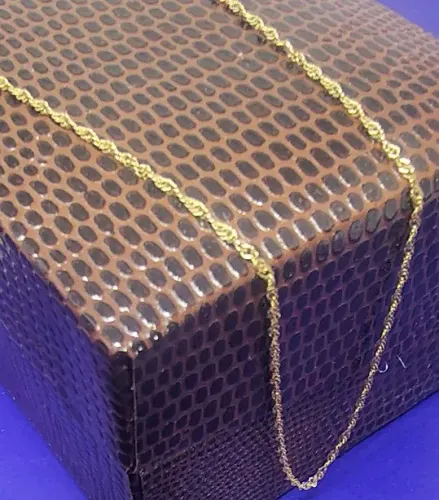 Tornozelheira Torcida Ouro 18 Kilates Peso 0.61Gramas Tamanho 27 Cm x 0.5 mm              