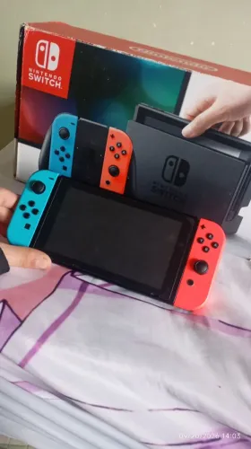 Nintendo switch v1 desbloqueado+ Cartão 128gb com 9 jogos instalados.