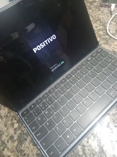 vision tab 10 versão 13 Android . Vai com carregador, caixa , teclado .