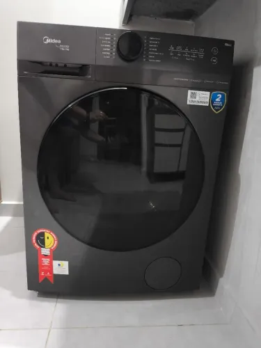 Vendo máquina Midea lava e seca nova 