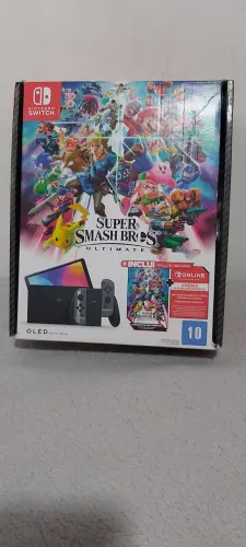 Nintendo Switch OLED Desbloqueado + Super Smash Bros Ultimate