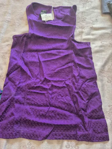 Regata Colcci roxa tecido td trabalhado. Tam.P. 35,00