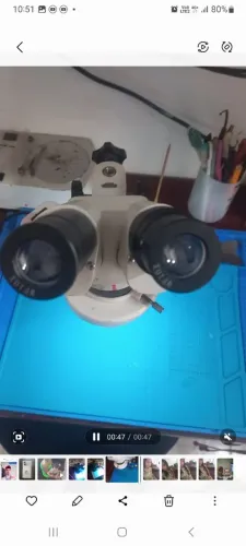 Microscópio binocular ak 04
