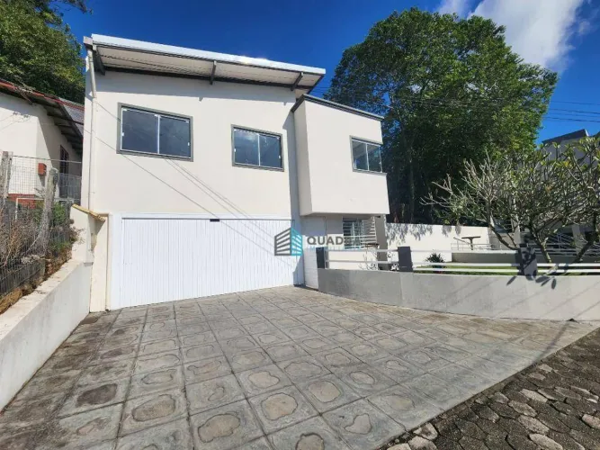 Casa com 3 dormitórios para alugar, 110 m² por R$ 6.173,00/mês - Carvoeira - Florianópolis