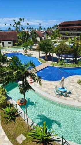 Oka Beach Residence | 60m² | 2 quartos | 1 suíte | vista para piscina