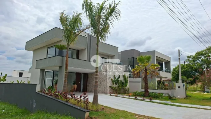Casa com 4 dormitórios à venda, 240 m² por R$ 2.600.000,00 - Condomínio Ninho Verde II - P