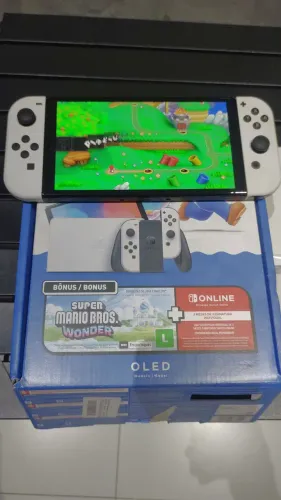 Nintendo switch Oled desbloqueado 128gb com caixa excelente estado
