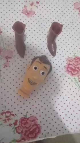 Vendo cabeça e um par de Botas. Do xerife woody