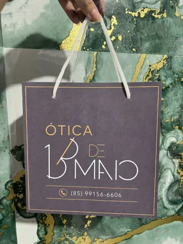 Sacolas personalizadas ótica 13 de maio 