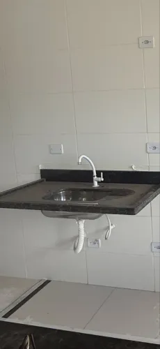 Pia de granito preta com cuba de inox