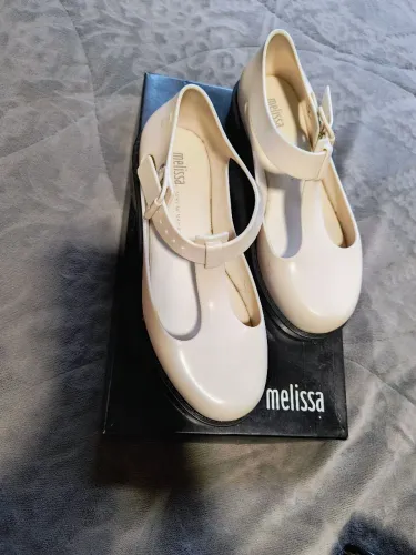 Melissas, bolsa e bota