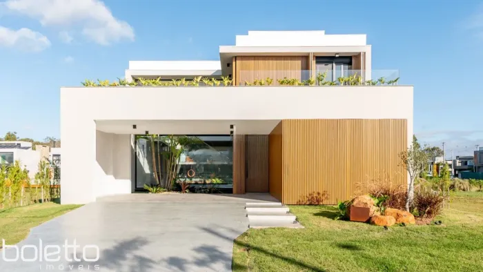 Linda casa para comprar com 4 suites em condomínio TOP