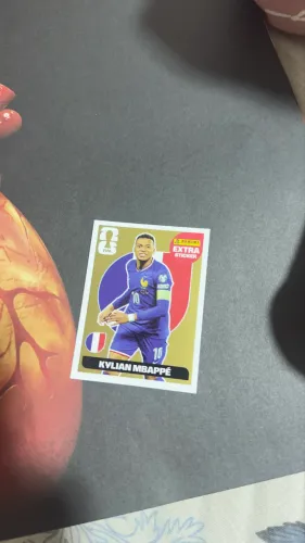 Figurinha Mbappe ouro