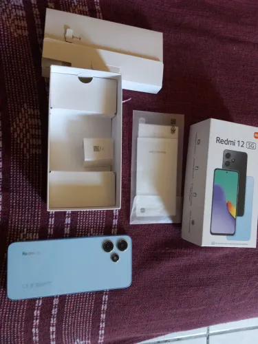 VENDO OU TROCO UM ISMART FONE REDIMI 12 COM 128 Gg semi novo!!