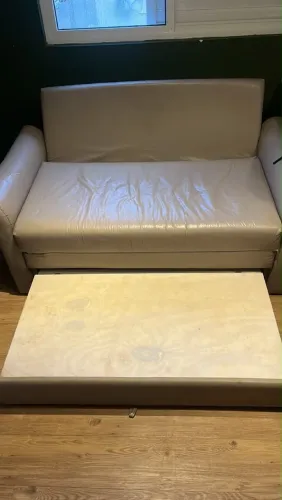 Sofá cama e almofada