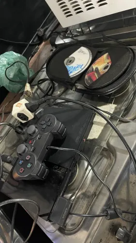Playstation 2 completo leito funcionando com mais de 20 Cd de  jogos 