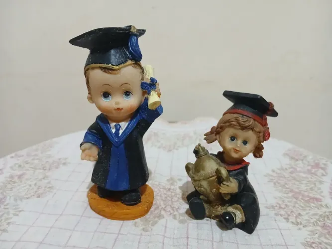 Formandos (bibelôs de resina)