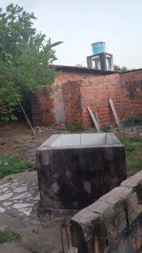 Casa com terrenos
