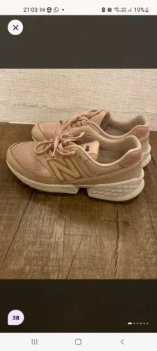 Tenis New Balance em couro 38
