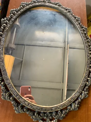 Espelho oval moldura em bronze