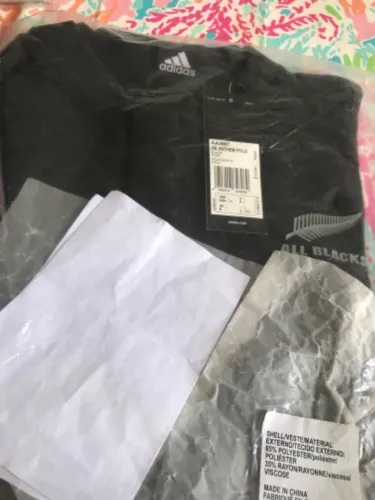 Queima Total: Camisa Polo All Blacks (Nova Zelandia) G Nova - Defeito: Botões a substituir