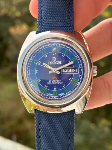 Relógio vintage Ricoh azul