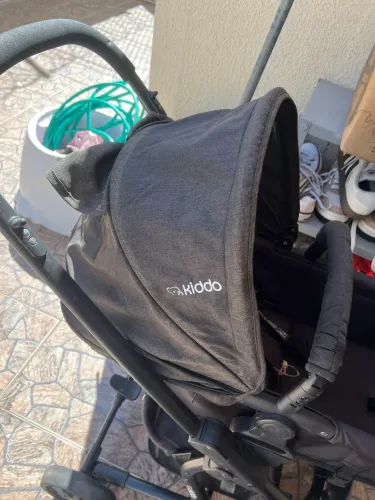 Carrinho de bebê + Bebê conforto Kiddo