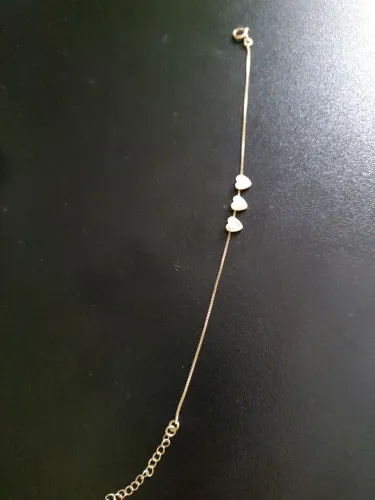 Pulseira de coração chapeado.