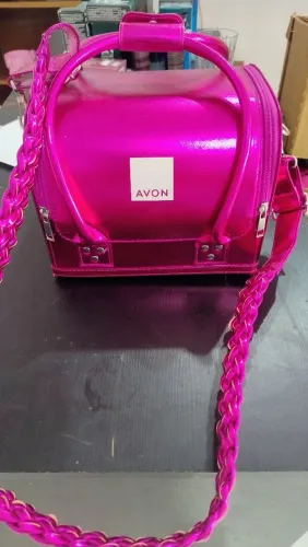 Maleta pink metalizada Avon ?