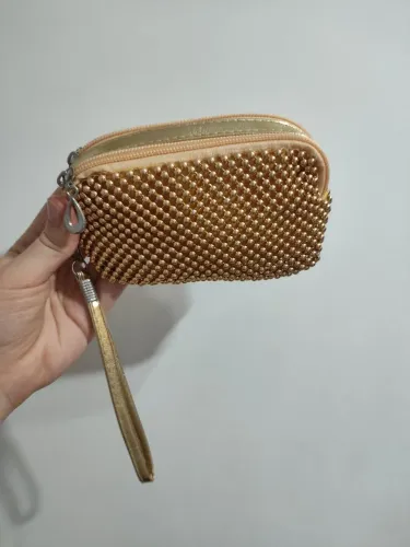 Bolsa nécessaire dourada pequena 