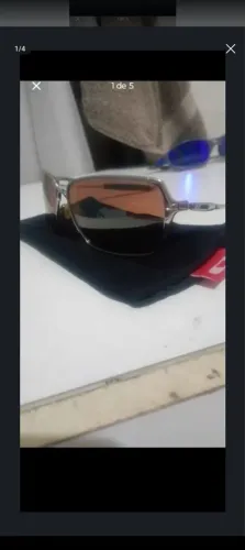 Oakley inmate polished Chrome original com lente trincada 