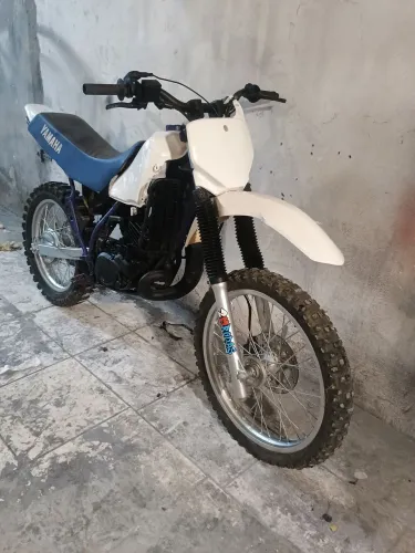 DT parte de baixo 200 de cima 180 moto tá rodando filé quem gosta de trilha a moto é boa.