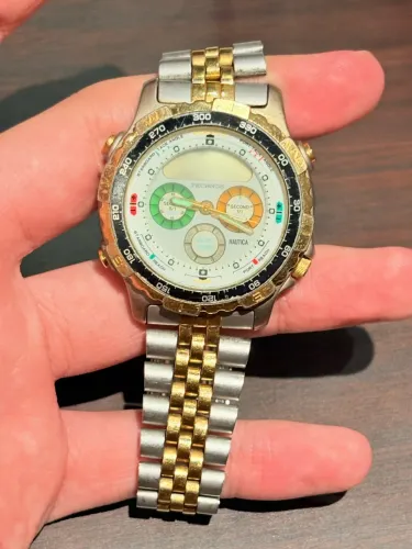 Relógio Technos Nautica Vintage Anadigi W.R. 100M Bipartido / Dourado e Prata