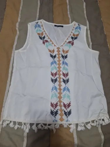 Blusa com franja 