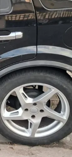 Jogo de rodas de liga leve, aro 17, com pneus meia vida,