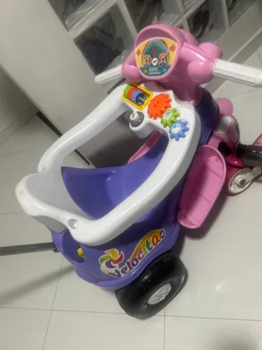 Motoca menina