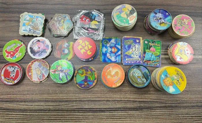 Lote com 260 tazos Elma chips variados
