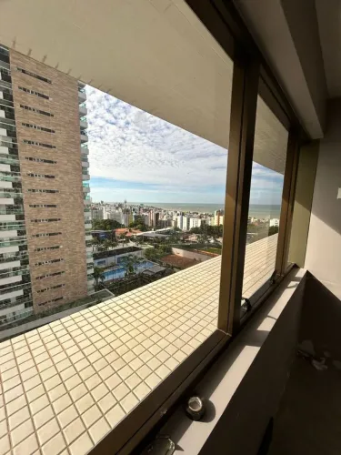 Ótima sala com vista do mar