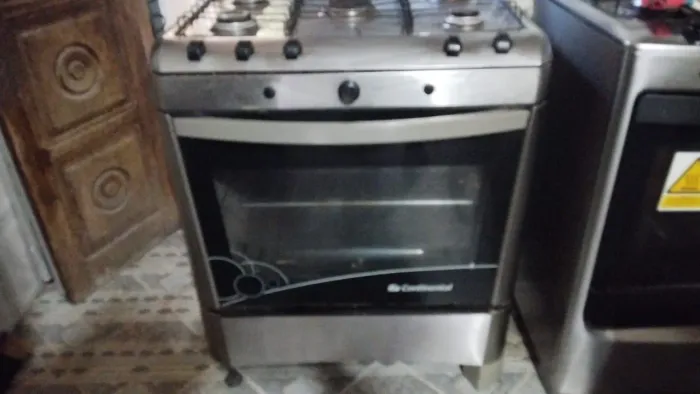 Um lindo fogão de 5bocas funcionando tudo bem perfeitamente