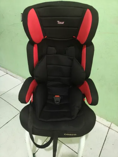 Cadeirinha de bebê para carro.