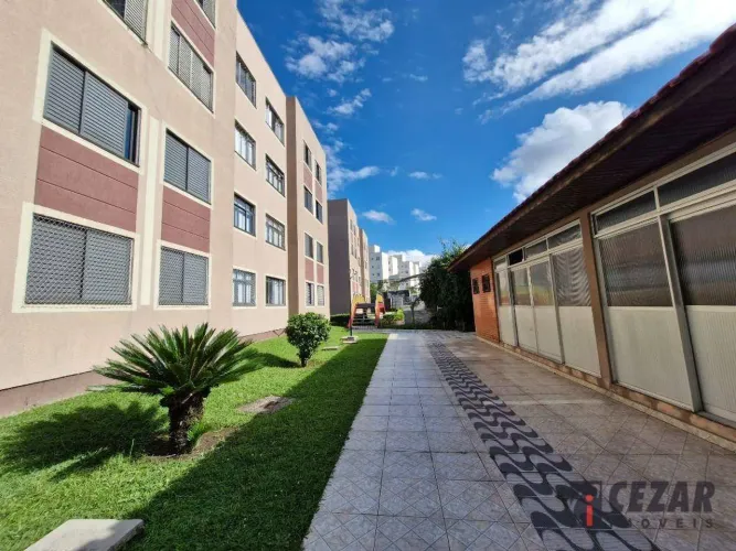 Apartamento com 3 dormitórios para alugar, 57 m² por R$ 1.690/mês - Pinheirinho - Curitiba
