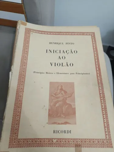 Livro e partituras de violão ,1,2,3.