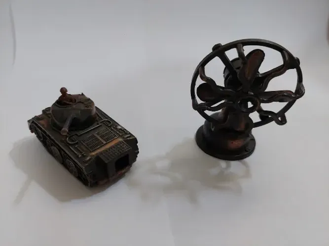 Apontador de metal ventilador e o tanque de guerra