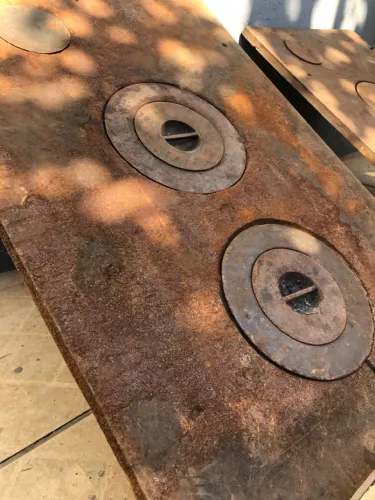 Tampas de fogão a lenha antigas