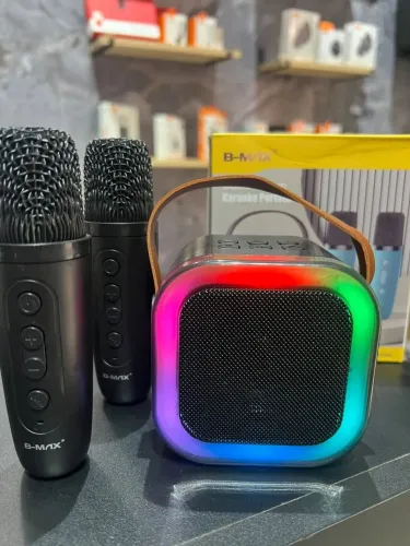 Caixinha Bluetooth karaokê com 2 microfones