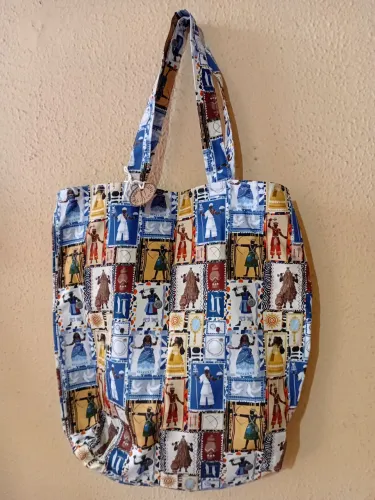 Bolsa de sarja estampa dos Orixás feito à mão.