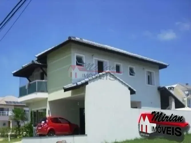 Casa com piscina para venda em condomínio fechado de alto padrão em Peruibe. 3 dormitórios